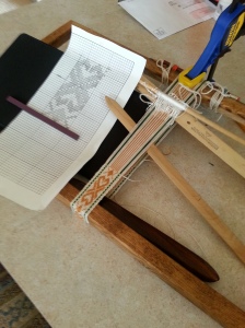 1st weaving sample. We use a picture frame as a loom!